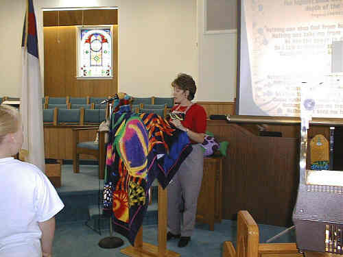 Mrs. Debbie leading the music in the opening ceremony